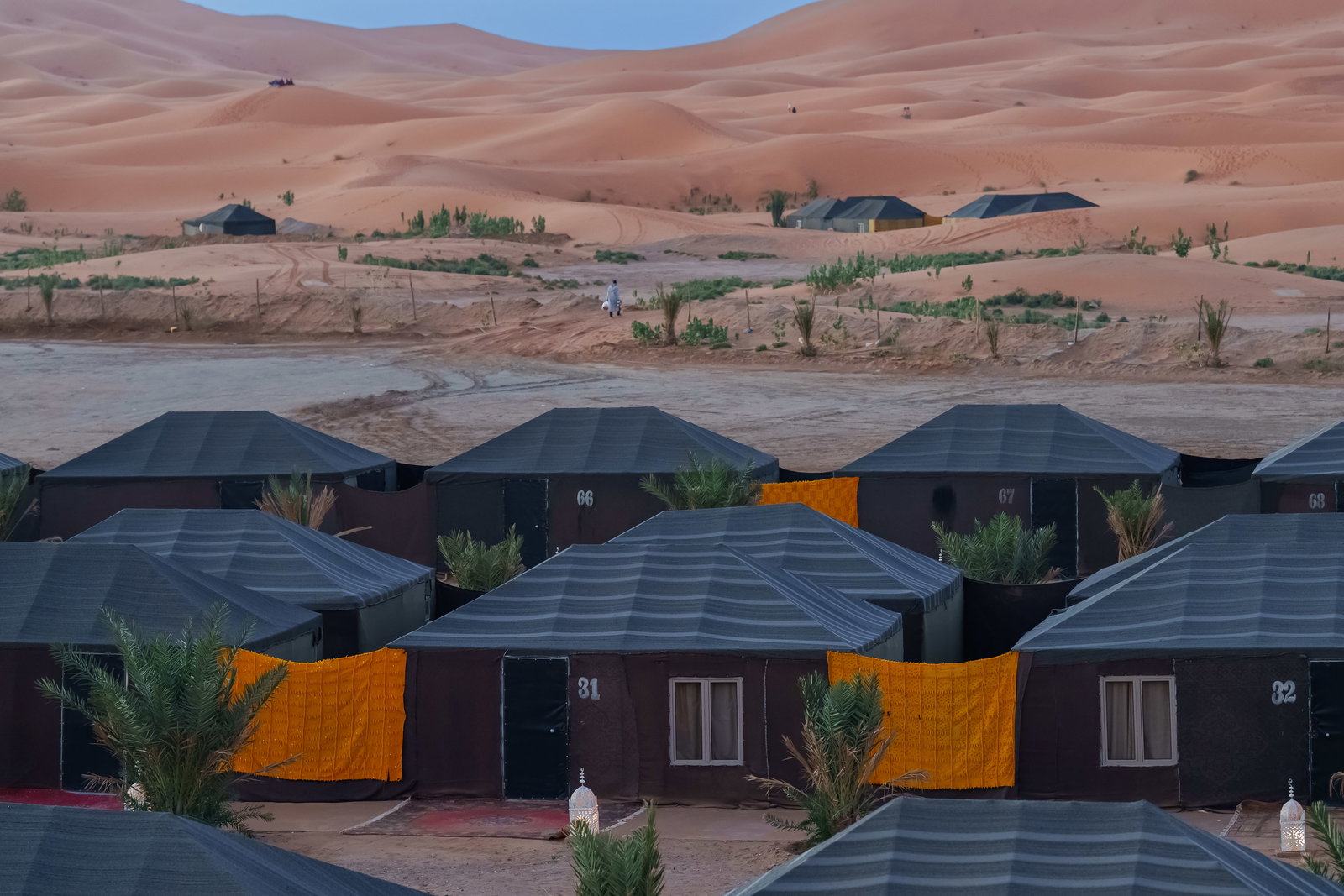 A night in the Erg Chebbi — three thousand stars and the distant drum of the Gnawa.